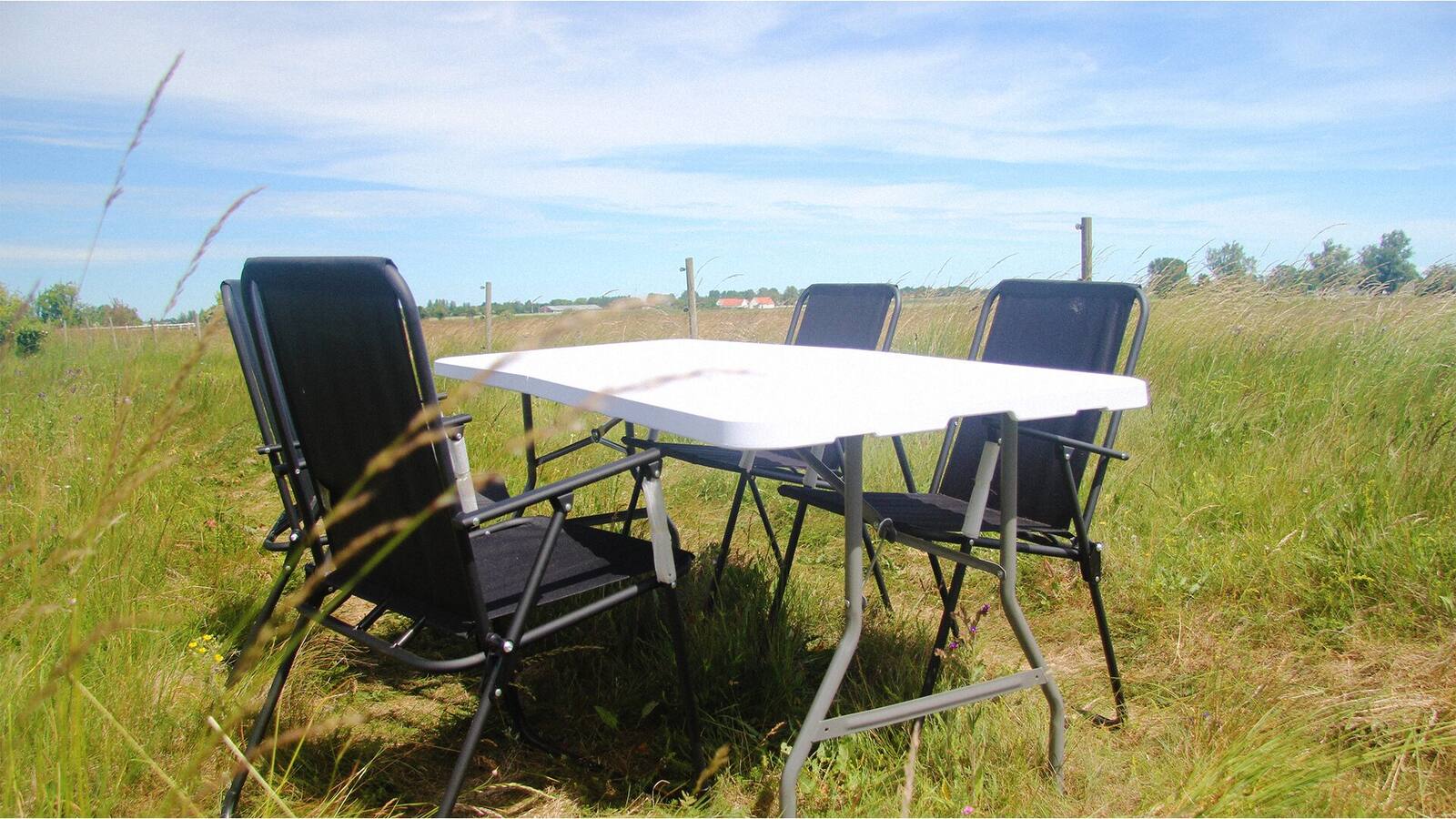 Table and chairs set up outdoors