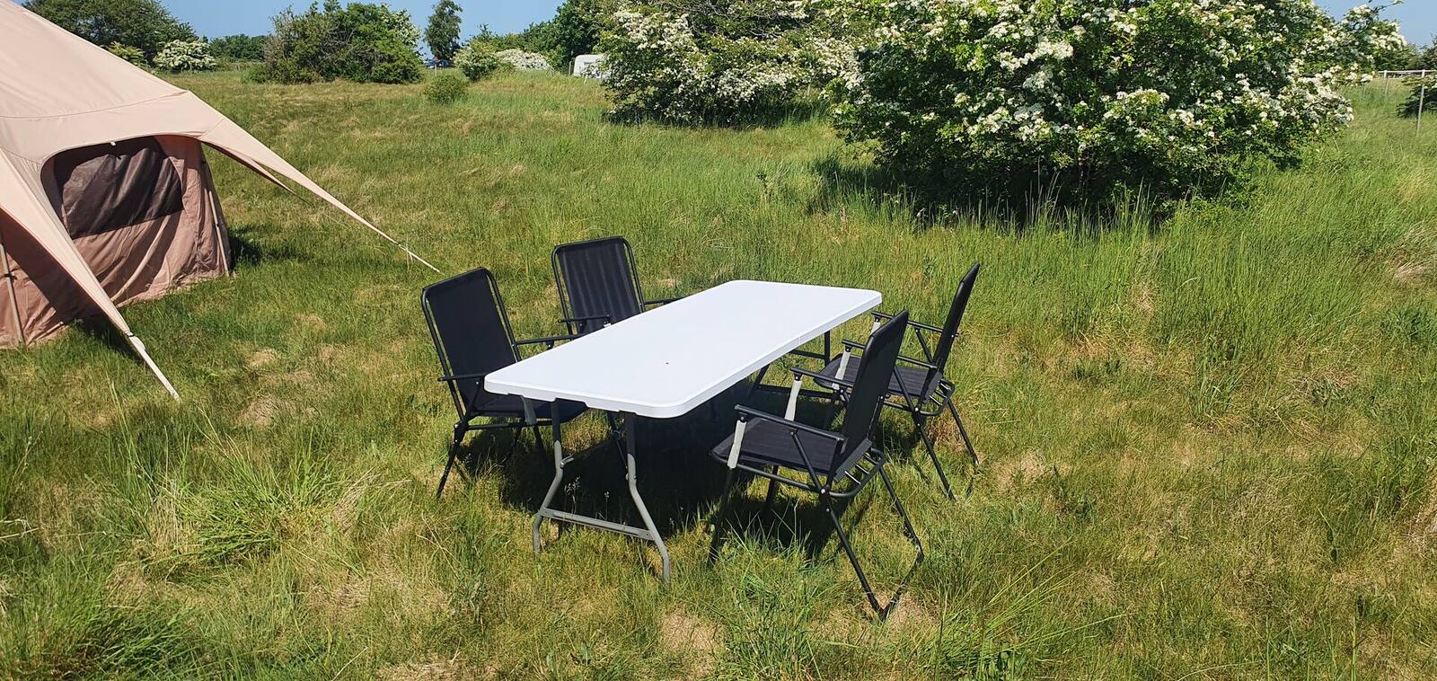 Dining table beside the tent